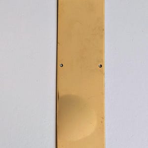 plaque de poussée de porte en laiton vintage