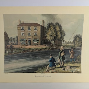 May include: An antique print titled "Bottom Fishing" depicts a serene river scene. The artwork showcases a two-story building with a shop, and several figures fishing. The print is in muted tones of green, brown, and blue.