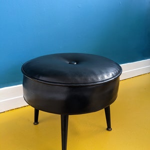 Midcentury black vinyl footstool by Sherbourne