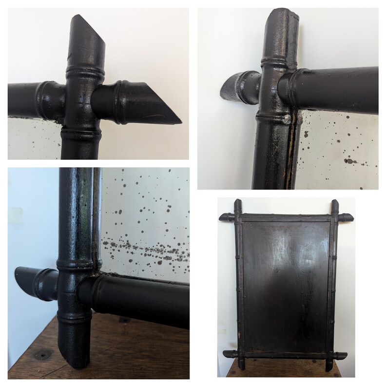 May include: Black painted bamboo mirror frame with a rectangular mirror. The mirror has a distressed look with small white spots on the surface.