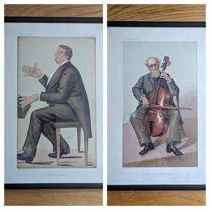 May include: Two framed black and white illustrations of musicians. The first illustration shows a man playing the piano. The second illustration shows a man playing the cello. Both illustrations are from Vanity Fair.