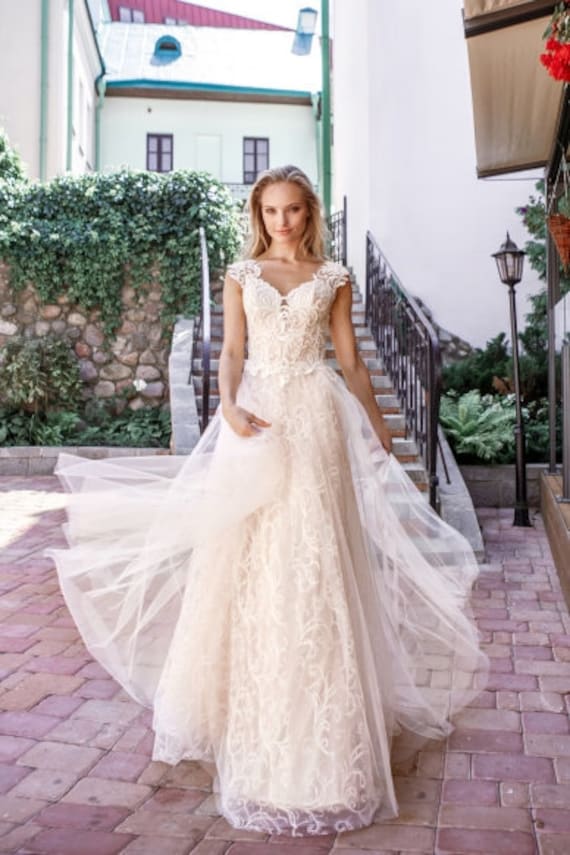 blush plus size wedding dress