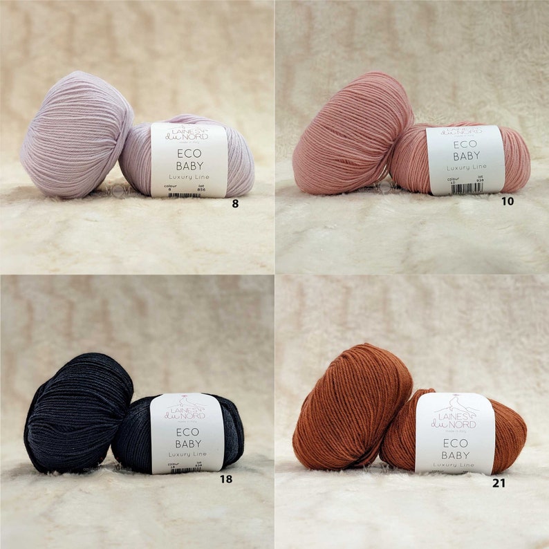 May include: Four skeins of yarn in different colors: light purple, light pink, dark gray, and brown. Each skein has a white label with the text "Laines &  Nord Eco Baby Luxury Line" and a number: 8, 10, 18, and 21.