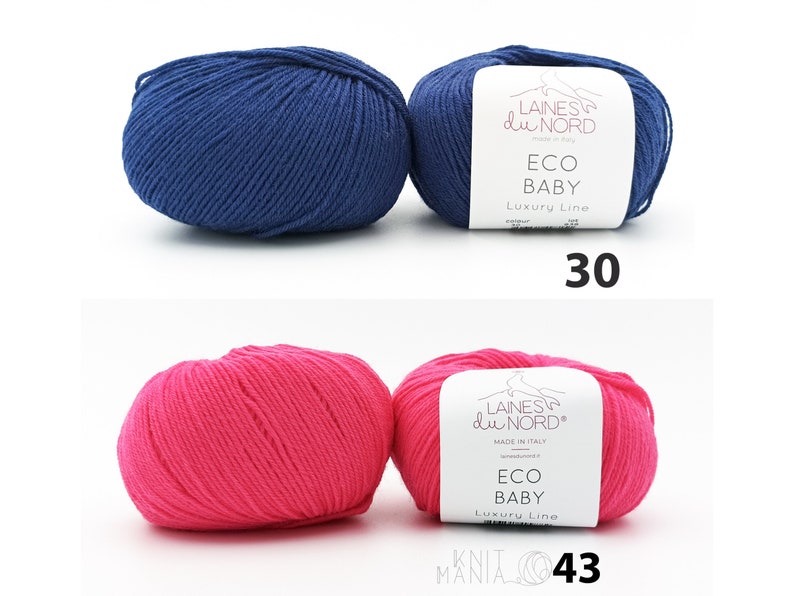 May include: Two skeins of yarn, one blue and one pink, labeled "Laines du Nord Eco Baby Luxury Line". The blue skein is labeled "30" and the pink skein is labeled "43".