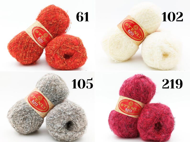 Puede incluir: Cuatro ovillos de lana en diferentes colores: naranja, blanco, gris y rojo. Cada ovillo tiene una etiqueta roja con el texto "Stenli Rossi". Los ovillos est&aacute;n etiquetados con los n&uacute;meros: 61, 102, 105 y 219.