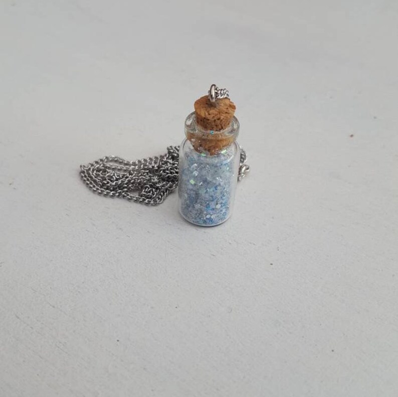 Whiteblue stardust necklace.