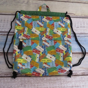 Handmade Cotton Drawstring Backpack: Travel License Plate Print
