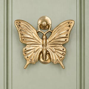 Batedor de porta em forma de borboleta, em latão maciço