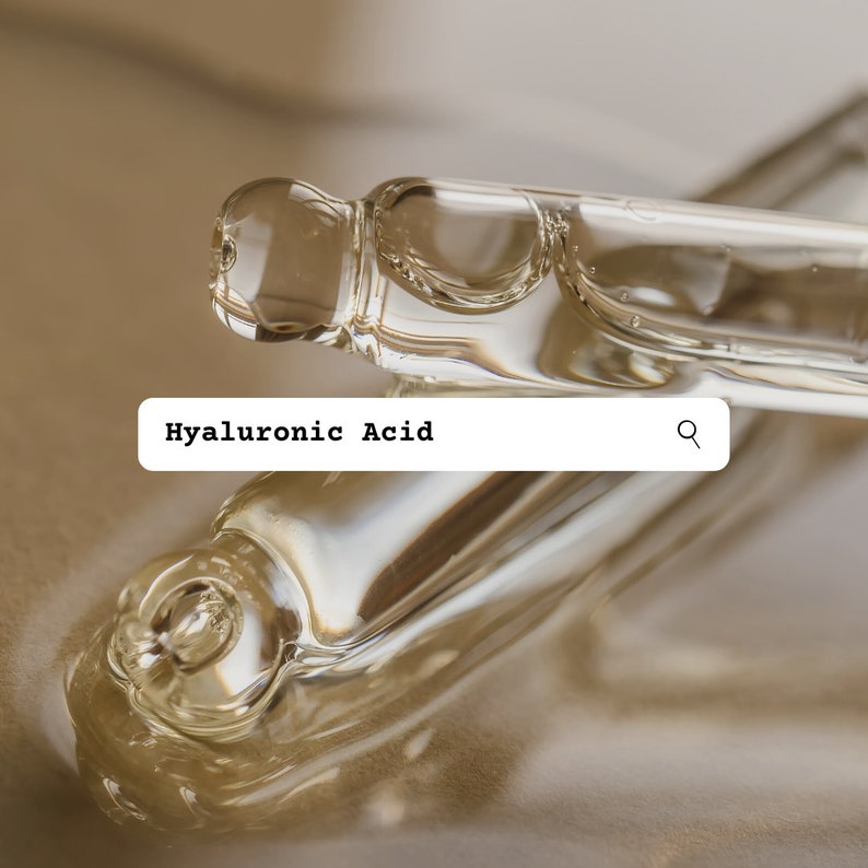 May include: Two clear glass vials of hyaluronic acid serum, one lying on top of the other, with a search bar above them that reads "Hyaluronic Acid".