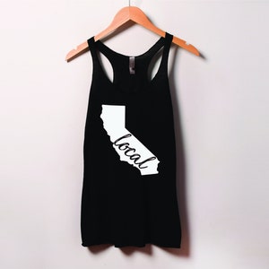 May include: Black tank top with a white outline of the state of California and the word "local" written inside the outline.