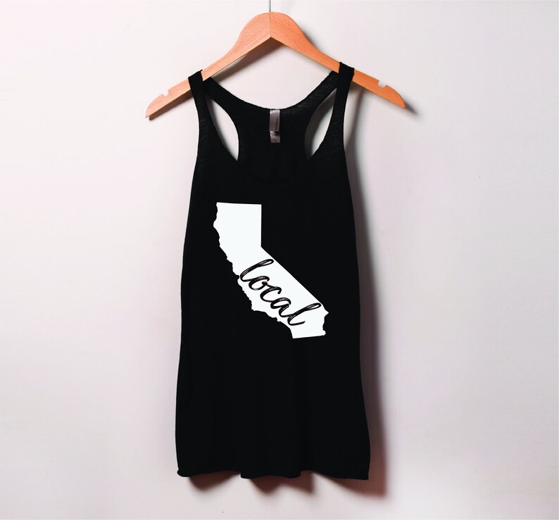 May include: Black tank top with a white outline of the state of California and the word "local" written inside the outline.