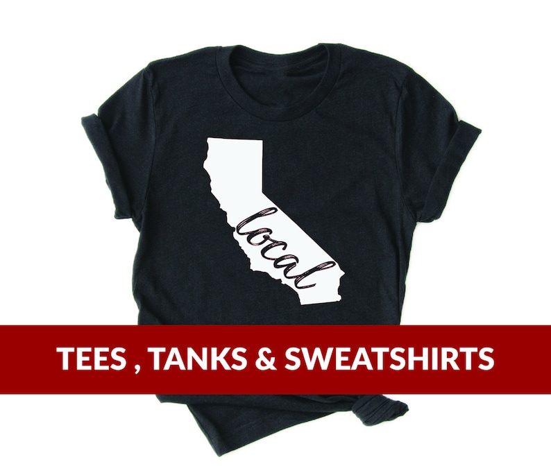 May include: Black t-shirt with a white outline of the state of California and the word "local" written inside the state.  The t-shirt is available in tees, tanks, and sweatshirts.