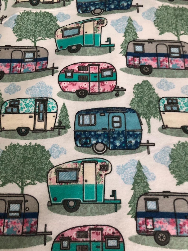 May include: A repeating pattern of colorful vintage camper trailers on a white background. The trailers are decorated with floral patterns and various colors, including pink, teal, and blue. Trees and clouds are also featured in the design.