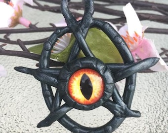 Cute yet creepy eldritch eye charm!