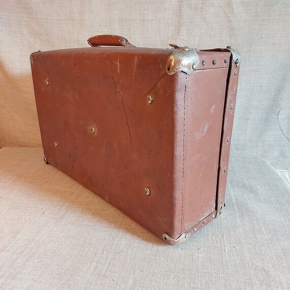 Small light cheap suitcase