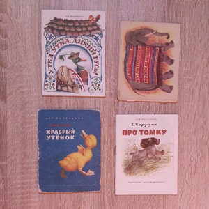 Set of 4 small books in Russian for children with bright pictures in soft cover