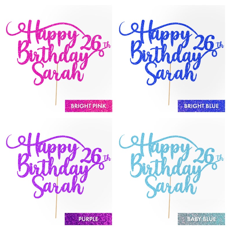 May include: Four cake toppers with the text "Happy 26th Birthday Sarah" in different glitter colors: bright pink, bright blue, purple, and baby blue.