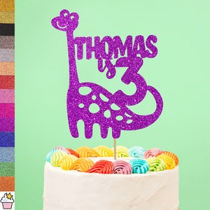 Cakeshop パーソナライズされた恐竜の誕生日グリッターケーキトッパー | カスタムカラー 名前と年齢を問わず恐竜ケーキデコレーション ブラキオサウルスパーティー
