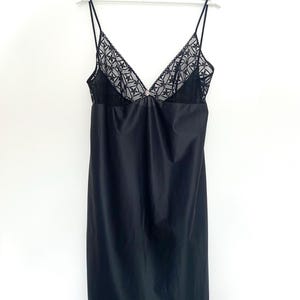 70s vintage black nylon slip dress with lace finish. Pinup style nightie lingerie. 37" L