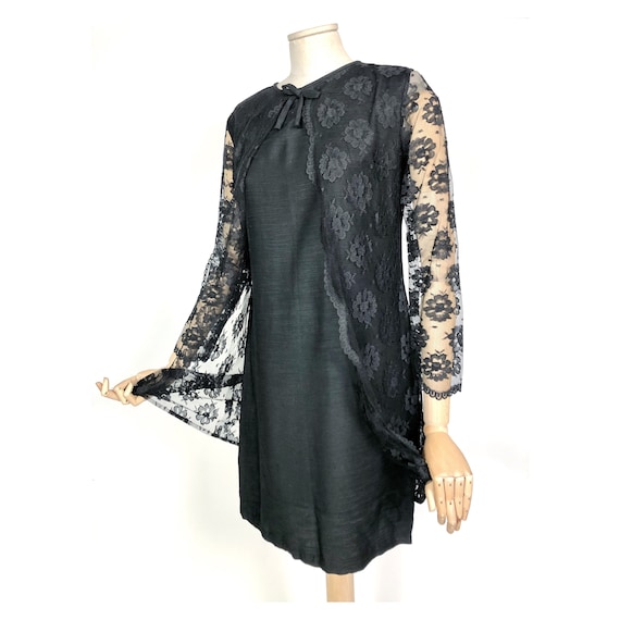 Little black dress. Lace and silk dress. Dramatic.