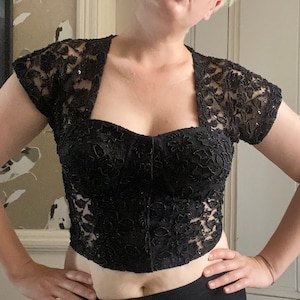 Vintage embellished shirt sleeve black lace bustier top. Sparkly embellished stage top. M 38C