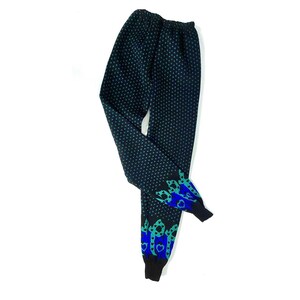 Folk inspired vintage winter joggers. Black woven leggings with a Scandi pattern. S
