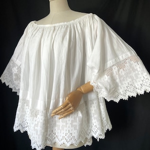 Vintage cotton choir shirt with embroidered hem. Cross pattern.