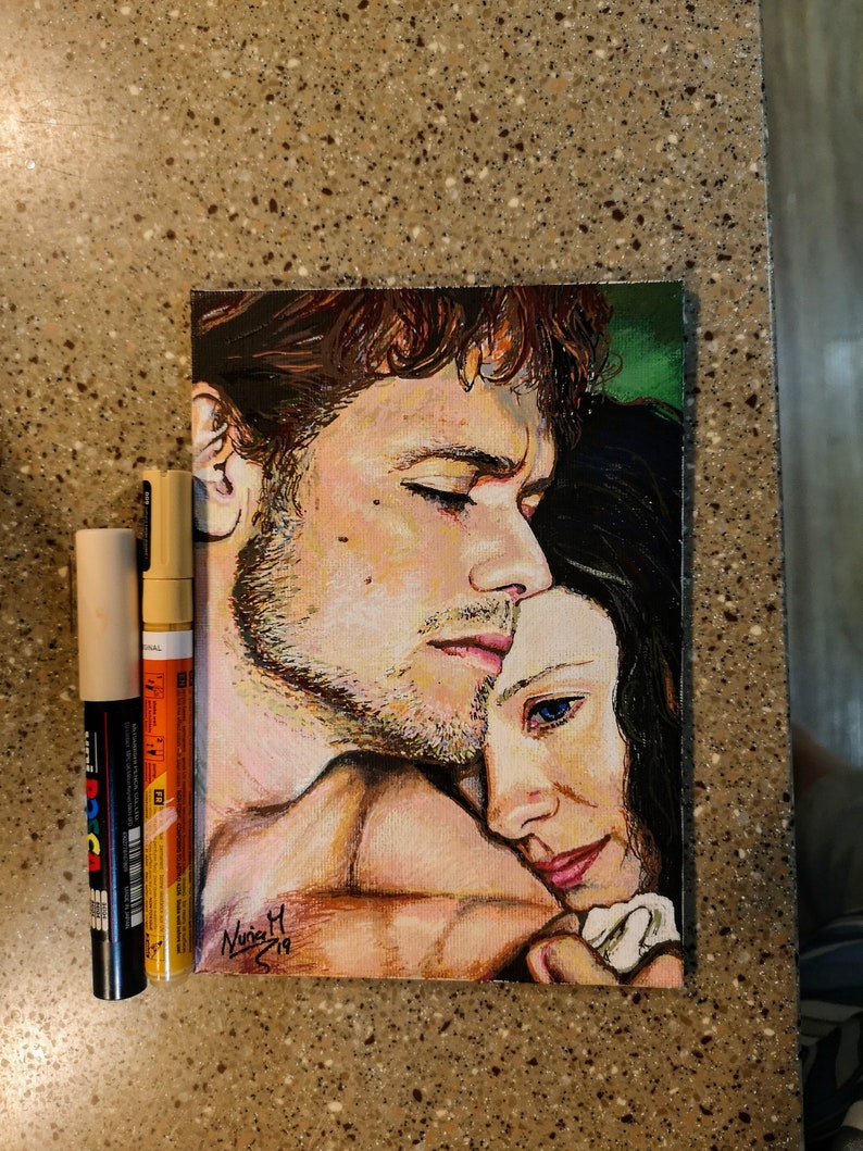 May include: A painting of a couple embracing. The man has brown hair and is wearing a white shirt. The woman has long black hair and is wearing a white shirt. The painting is done in a realistic style and has a warm color palette.