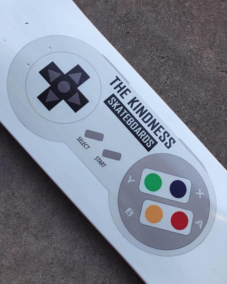 The Kindness Skateboard Co SNES Controller Deck