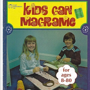May include: A book cover with a yellow background and the title "Kids Can Macrame" in red letters. The cover features two children, a girl and a boy, learning how to macrame. The book is for ages 8-80 and includes clear project instructions, knotting diagrams, and full-color photos.