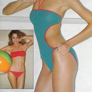 May include: Two women wearing different styles of red and blue swimsuits. The woman on the left is holding a beach ball.