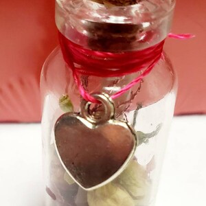 Crystal and flower love spell bottle