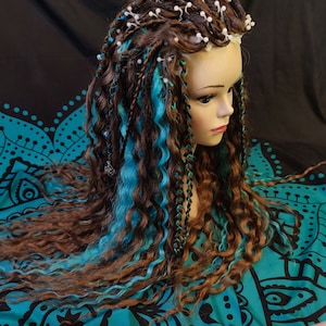 Chocolate mix of dreads, curls and braids with teal accents synthetic hair set