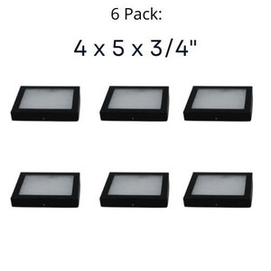 Op de afbeelding: Zes zwarte displaydozen met een fluwelen voering, elk met een afmeting van 10 cm bij 12,7 cm bij 1,9 cm.  6 Pack: 4 x 5 x 3/4"
