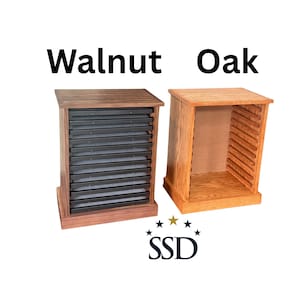 May include: Two wooden storage cabinets labeled Walnut and Oak. The walnut cabinet features multiple horizontal black shelves, while the oak cabinet has an open interior with side grooves. The logo SSD with five stars is centered below.