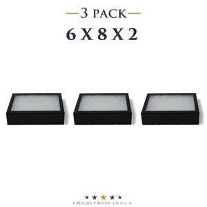 May include: Three black rectangular lights with white light panels. The text "-3 PACK- 6 X 8 X 2" is above the lights. The lights are proudly made in the U.S.A.