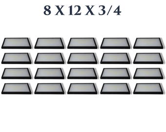 May include: A pack of 24 rectangular light fixtures with black frames and white illuminated centers. The dimensions are 8 x 12 x 3/4 inches. The text "-24 PACK-" and "8 X 12 X 3/4" is at the top. The text "PROUDLY MADE IN U.S.A." is at the bottom.