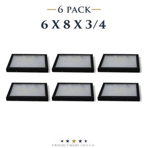 Pode incluir: Seis objetos retangulares pretos com um interior brilhante, dispostos em duas filas de três. Os objetos estão rotulados como "6 PACK" e "6 X 8 X 3/4". O texto "PROUDLY MADE IN U.S.A." está na parte inferior.