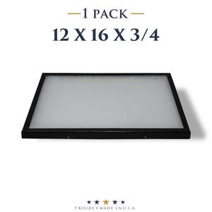 Puede incluir: Un marco rectangular negro con interior blanco. Las dimensiones son aproximadamente 30,5 x 40,6 x 1,9 cm. El texto "-1 PACK-" está en la parte superior. El texto "PROUDLY MADE IN U.S.A." está en la parte inferior.