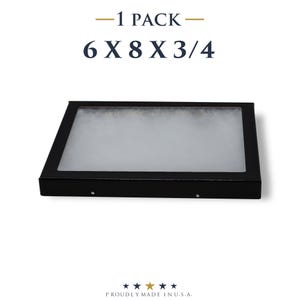 May include: A black rectangular display box with a clear top. The dimensions are 6 x 8 x 3/4 inches. The text "-1 PACK-" and "PROUDLY MADE IN U.S.A." are also visible.