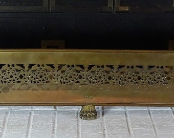 Victorian brass fireplace fender