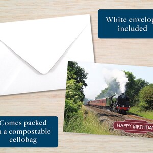 May include: A birthday card featuring a steam train traveling through a green forest. The card has a red banner with the text "Happy Birthday".