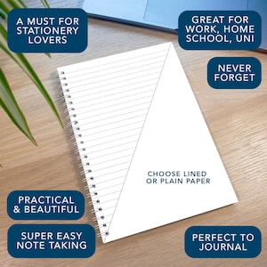 May include: A white spiral bound notebook with lined paper. The notebook has a triangle shape on the front and the text "Choose lined or plain paper" is printed on the bottom right corner.