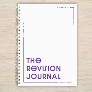 May include: A white spiral bound journal with the text "THE REVISION JOURNAL" in purple lettering.