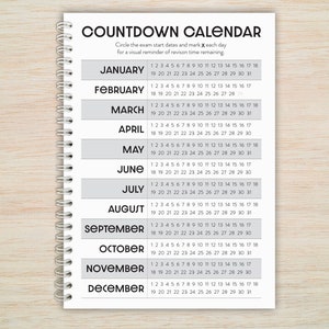 May include: A grey and white countdown calendar with a spiral binding. The calendar has the months of the year listed in black text, with each month having a grid of numbers from 1 to 31. The text "COUNTDOWN CALENDAR" is at the top of the page, with the instructions "Circle the exam start dates and mark X each day for a visual reminder of revision time remaining."