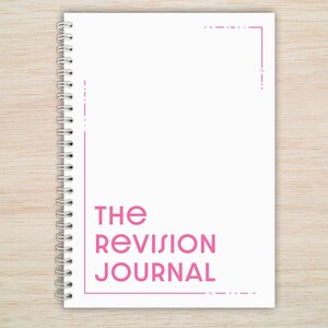 May include: A white spiral bound journal with the text "THE REVISION JOURNAL" in pink lettering.