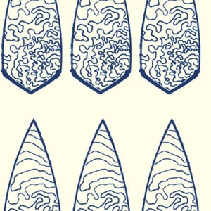 May include: Six blue and white patterned arrowheads, three with a pointed tip and three with a rounded tip.