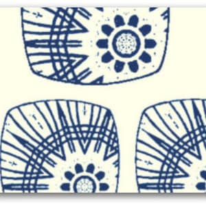 May include: A repeating pattern of navy blue floral and geometric designs on a cream background. The design features stylized flowers and geometric shapes, creating a cohesive and visually appealing pattern. The pattern is suitable for various applications, such as fabric or wallpaper.