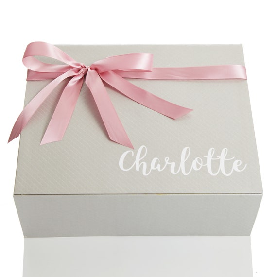 Premium Photo  Small gift box with bow pink and silver ribbon for