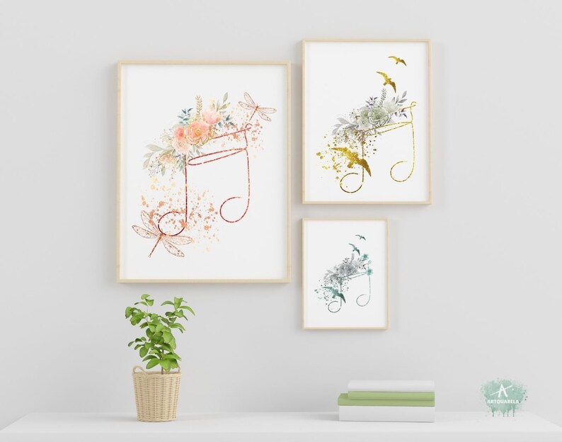 May include: Three framed prints with watercolor floral designs and musical notes. The prints are in gold, green, and pink.